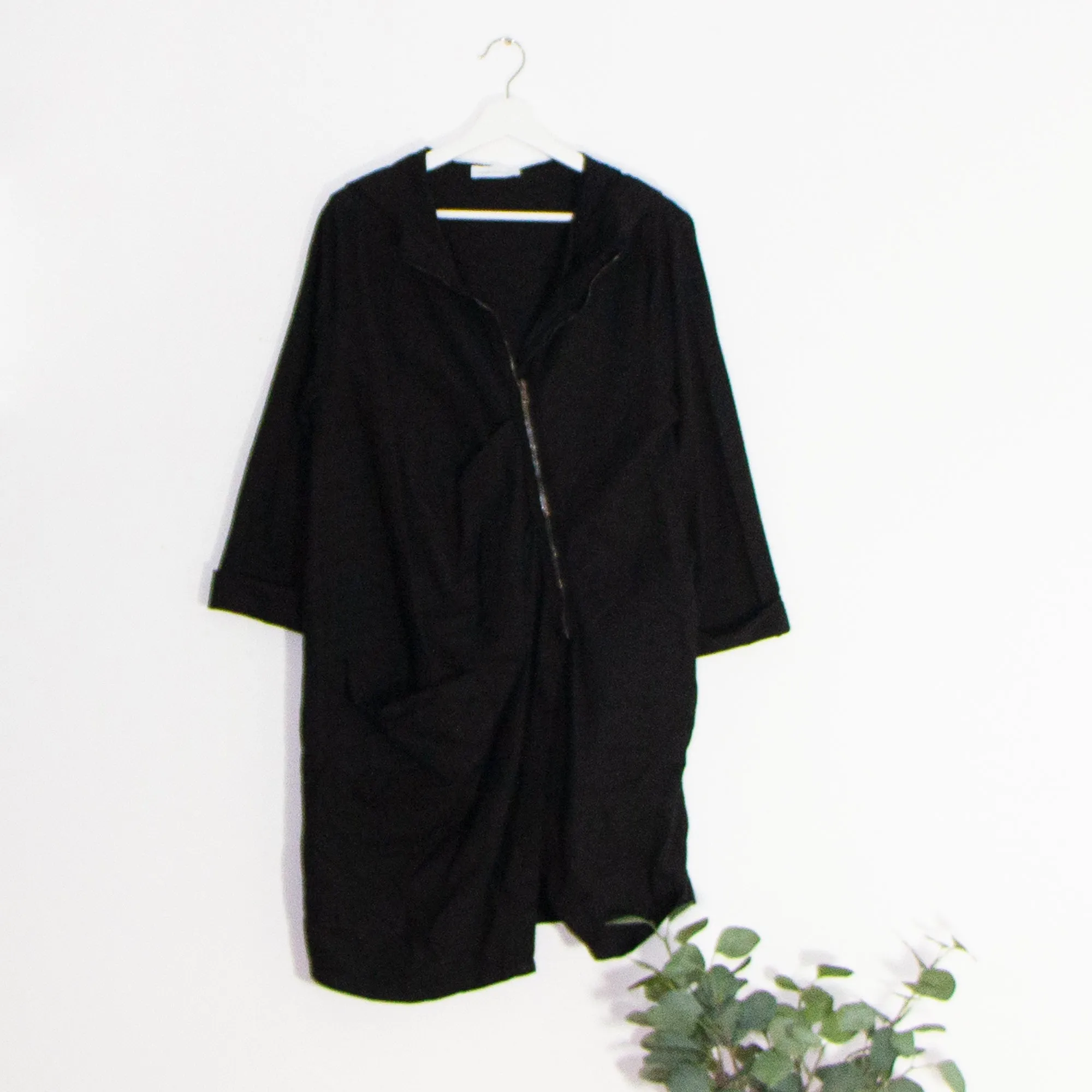 Edgy jacket with A-symmetric zip and oversized pocket