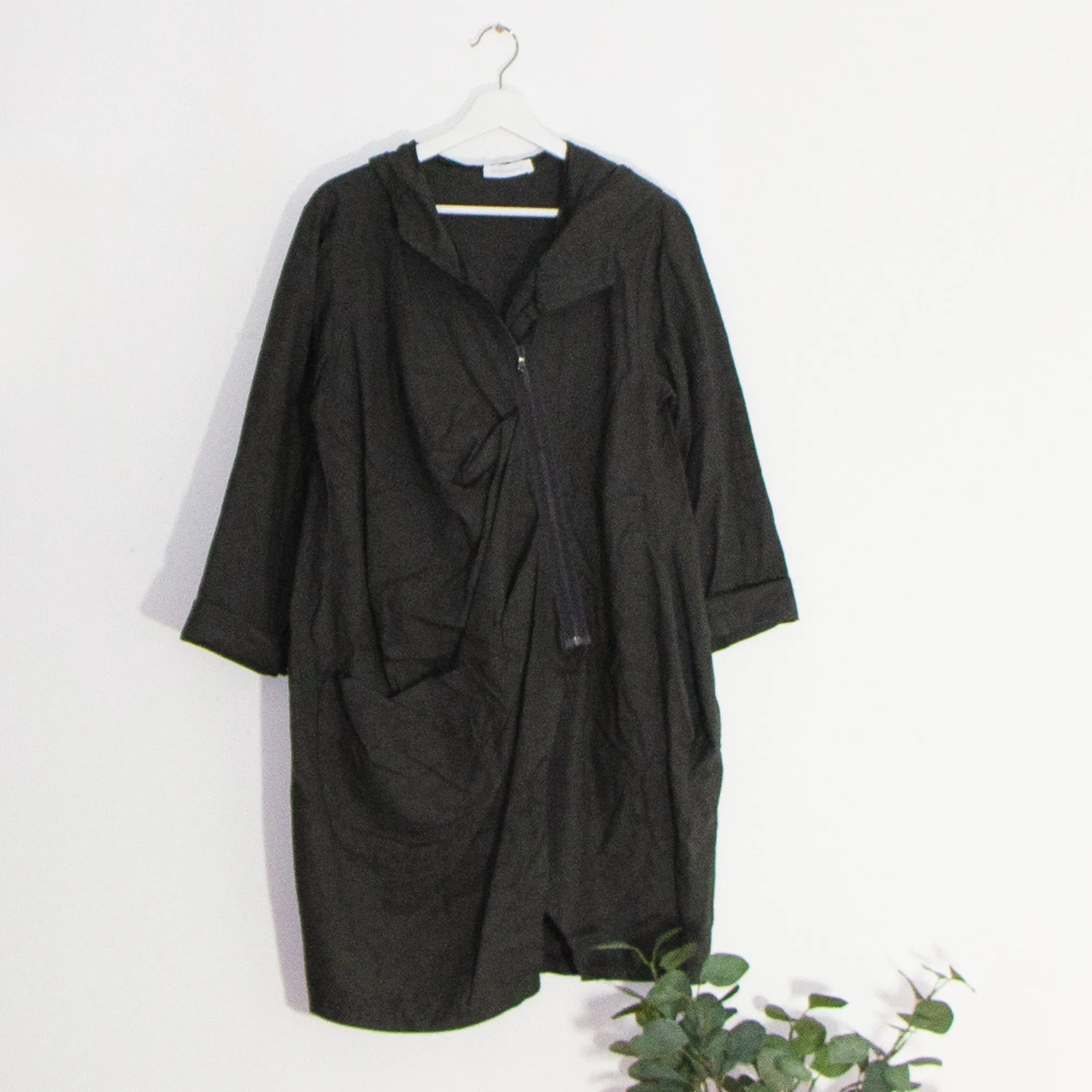 Edgy jacket with A-symmetric zip and oversized pocket