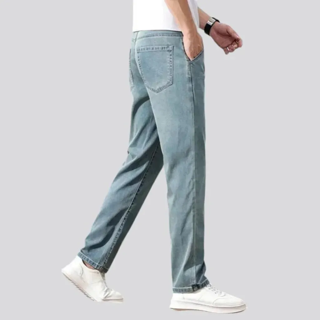 Thin men's stretch jeans